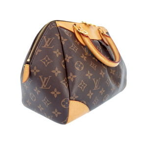 Louis Vuitton Segur Monogram Handbag